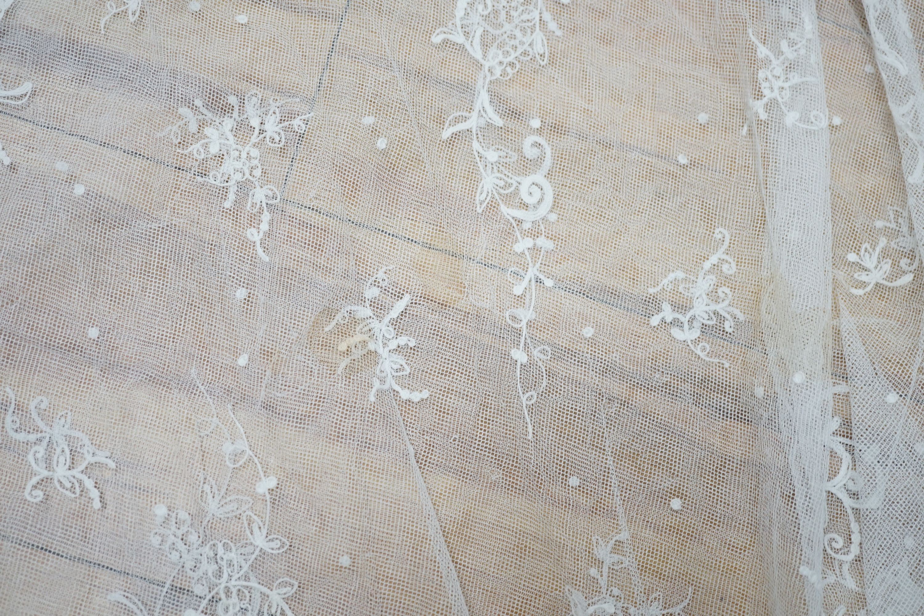 A needle lace skirt panel, a similar stole, various machine laces and trimmings